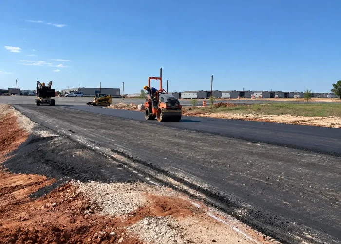 Road Construction Company Paving A New Subdivision