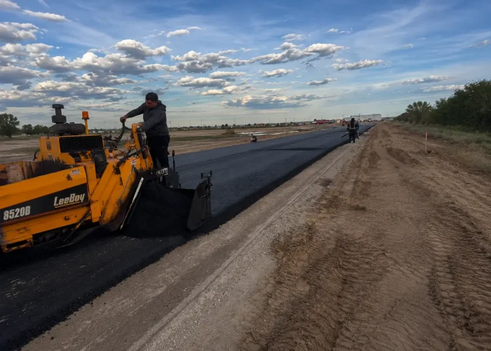 Road Construction Company Paving A New Subdivision